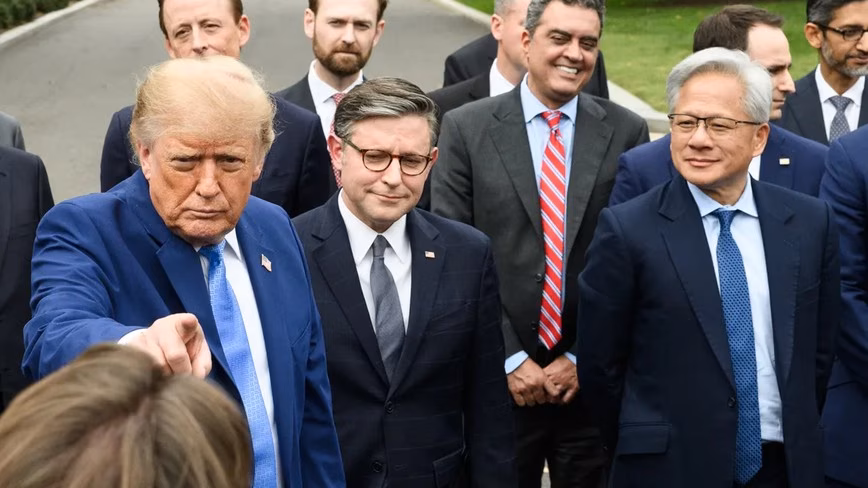 President Donald Trump points at reporters outside the West Wing, standing with tech chief executives after a White House luncheon Featured Image